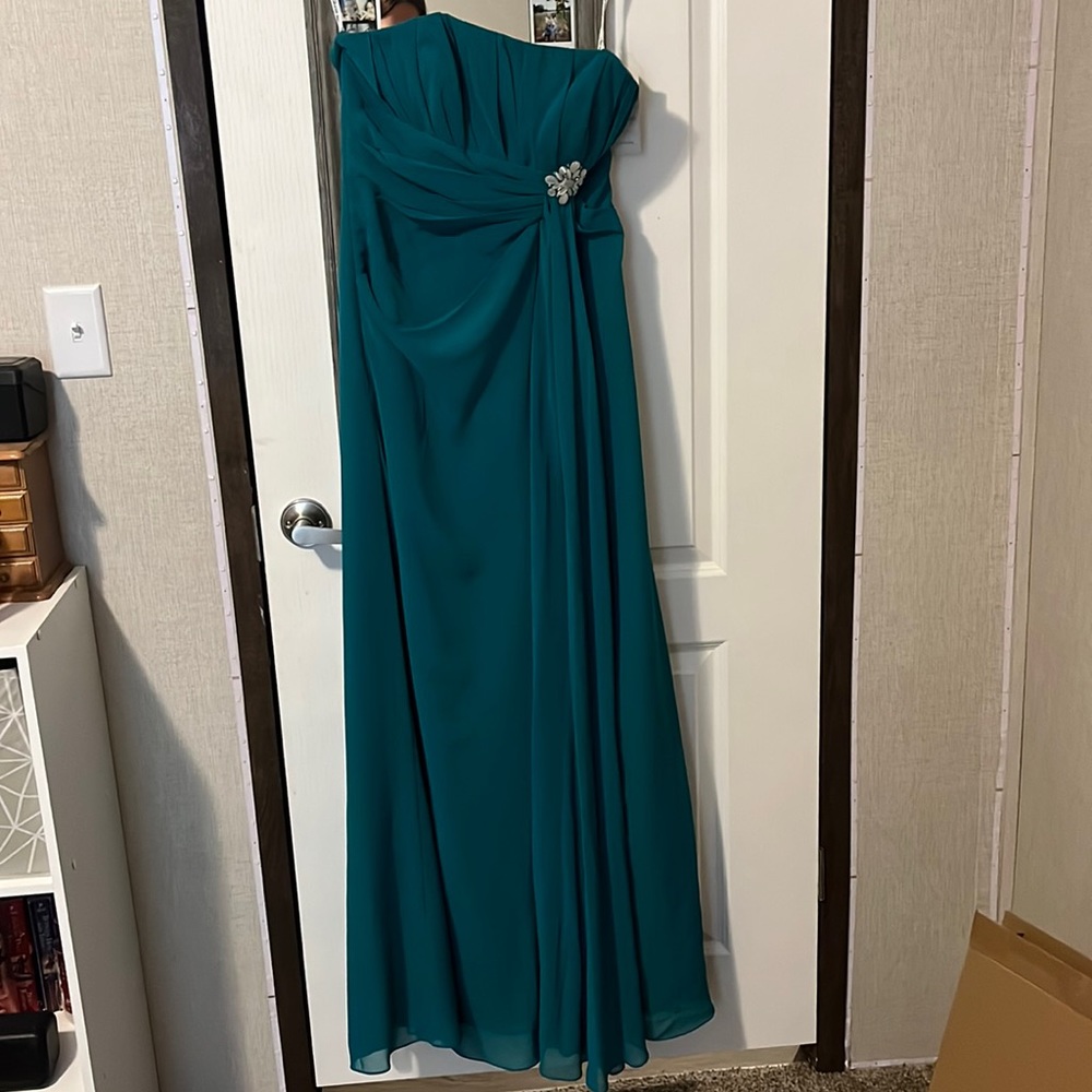 Very beautiful dress sadly never could wear it.